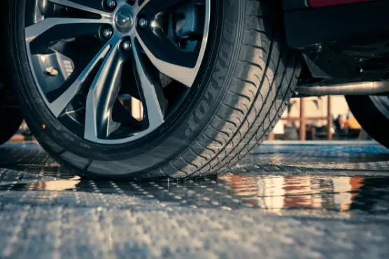 A new tyre on car shown at a low on floor angle.